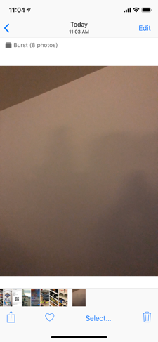 The Photos app showing a burst of 8 photos